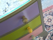 Multicolour glass-top bedside table with Viz decoupage
