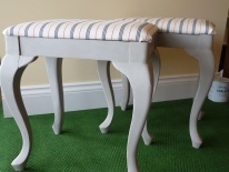 A pair of matching dressing table stools